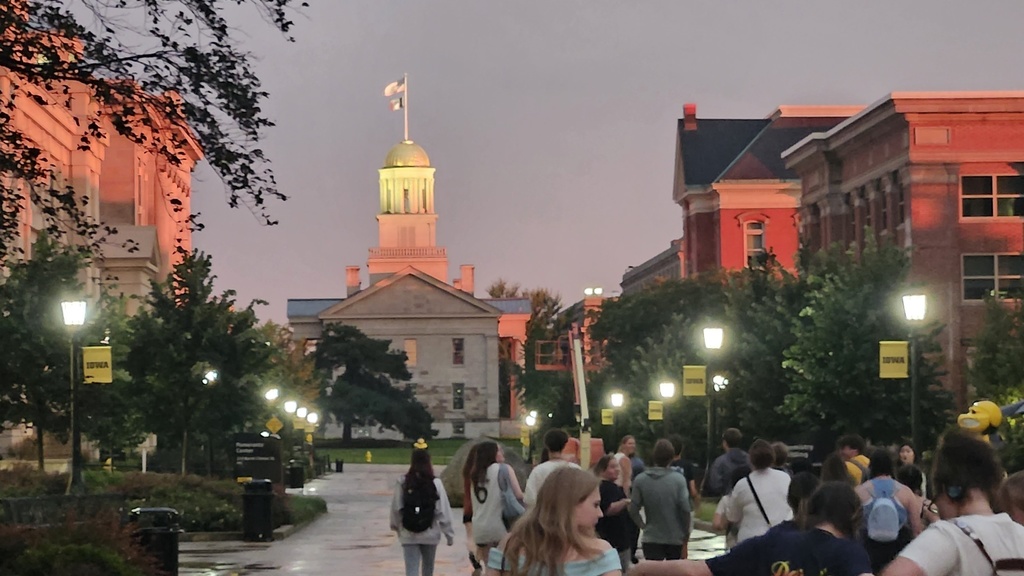 Campers walking at sunset