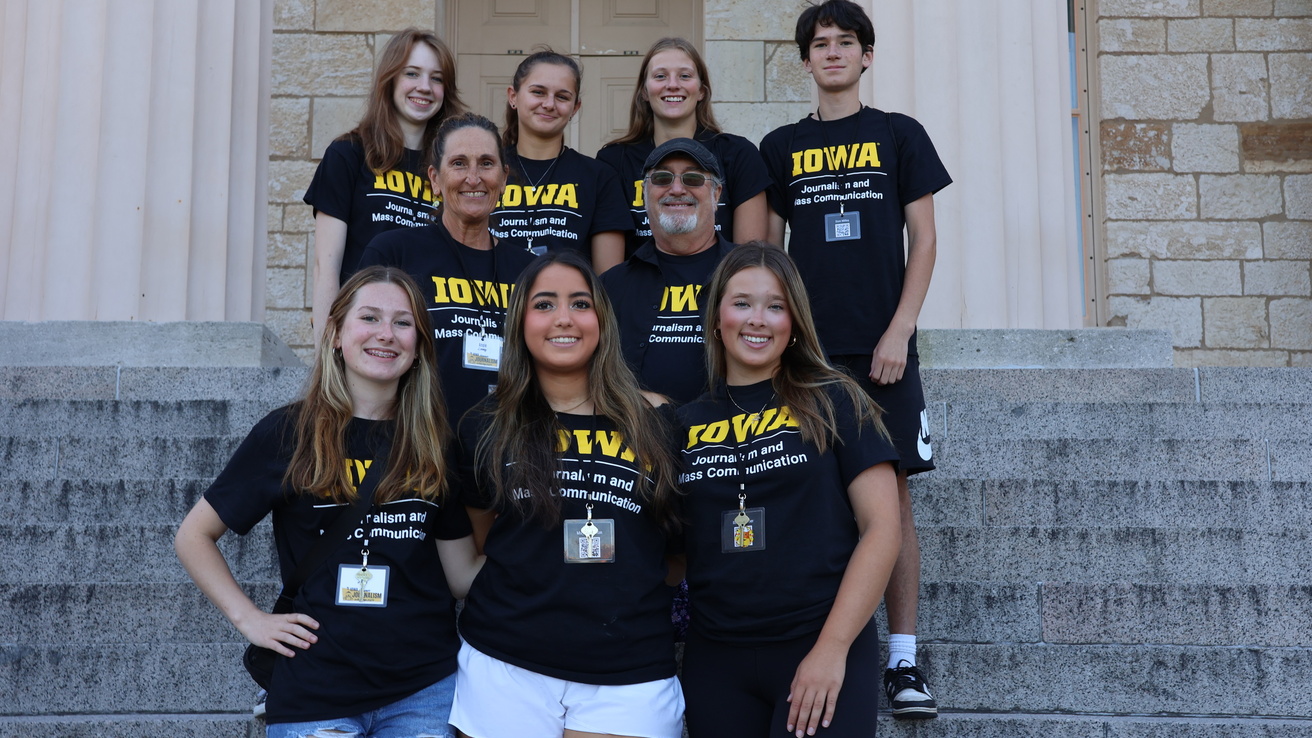 2024 broadcast students posing for pictures with instructors on Old Cap steps